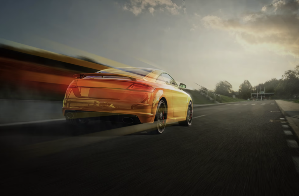 A fast yellow car on the road