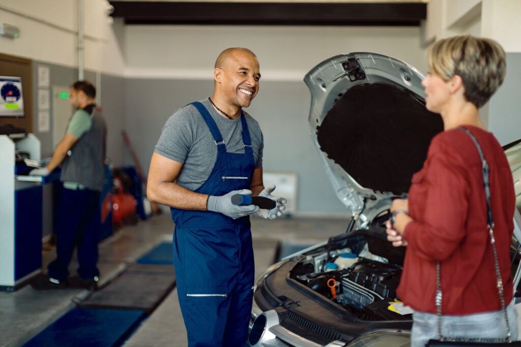 Mechanic talking to a client
